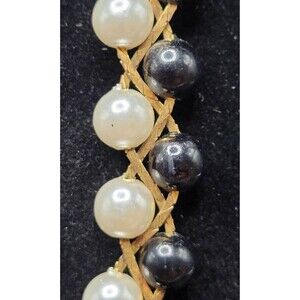 Intricate Gold Braiding Through Black and White Beaded Necklace